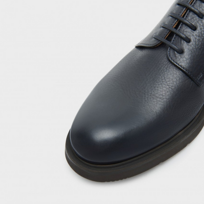 Zapatos de piel con suela resistente y acabado elegante para hombre